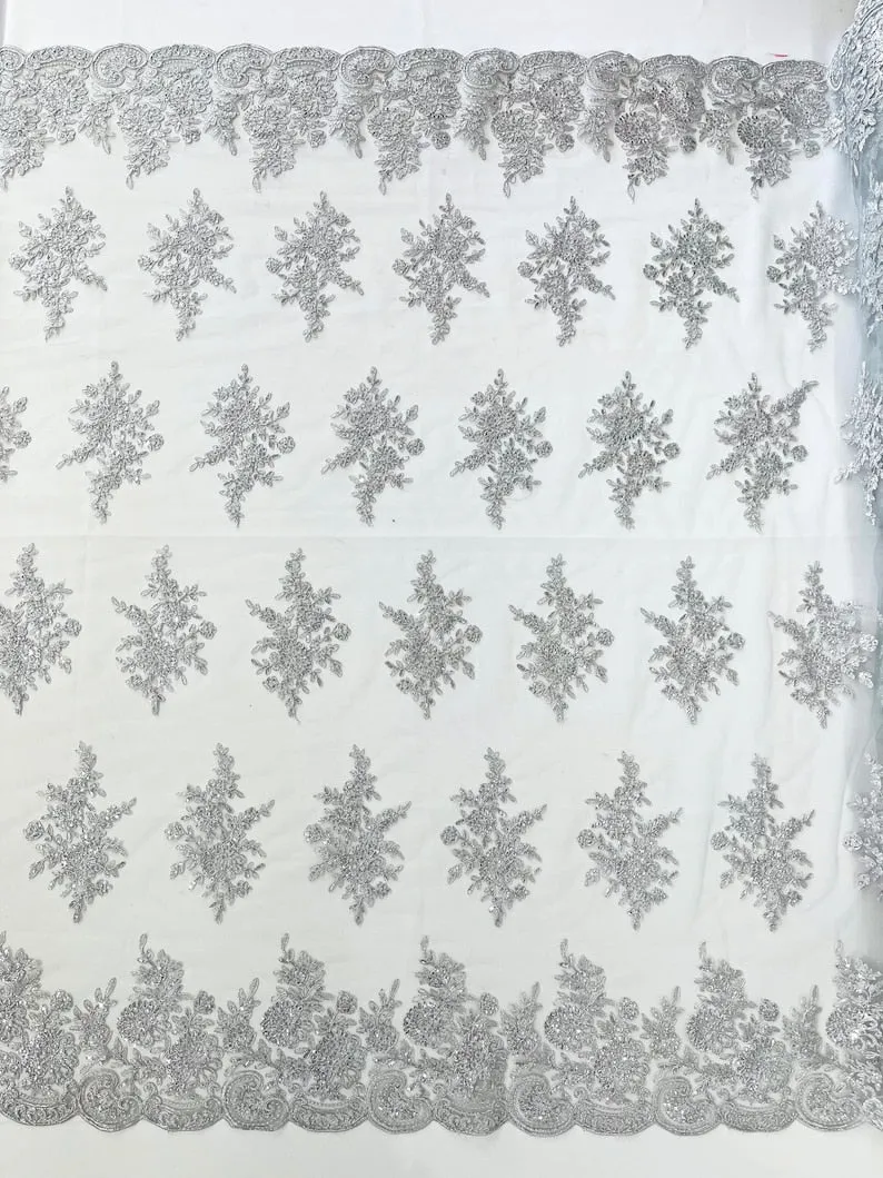 Floral corded embroider with sequins on a mesh lace fabric-prom-sold by the yard.