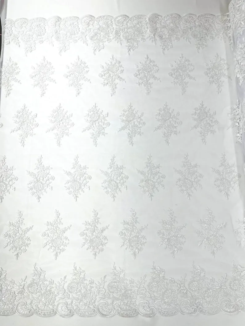 Floral corded embroider with sequins on a mesh lace fabric-prom-sold by the yard.